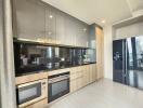 Modern kitchen with built-in appliances and ample counter space