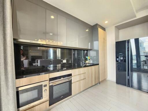 Modern kitchen with built-in appliances and ample counter space