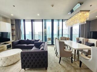 Modern living and dining area with city view