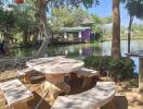 Scenic outdoor sitting area by a pond