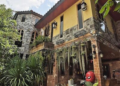 Exterior view of a home with brick and stone facade