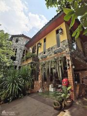 Exterior view of a home with brick and stone facade