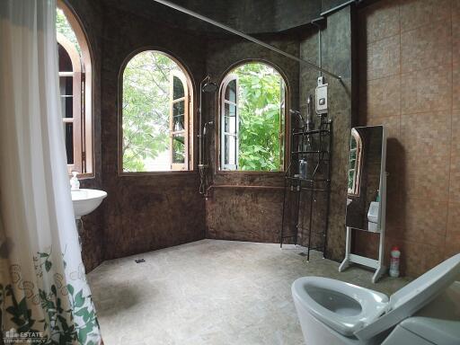 Spacious bathroom with large windows