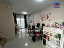 Living area with dining table and display cabinet