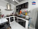 Modern kitchen with black and white cabinets