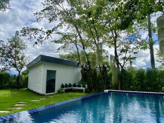 backyard with pool and guest house