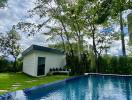 backyard with pool and guest house