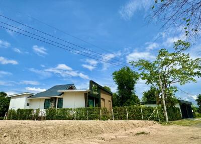 Two-story modern house with a large yard