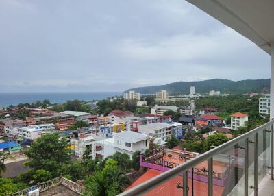 Balcony with cityscape and ocean view