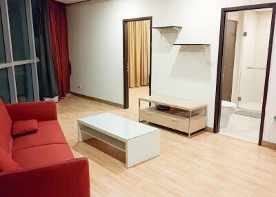 Living room with red sofa and modern furniture