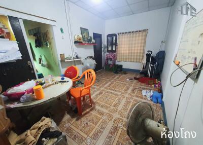 Living room with tiled floor and miscellaneous items