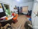 Living room with tiled floor and miscellaneous items