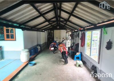 Garage space with motorcycles and various items