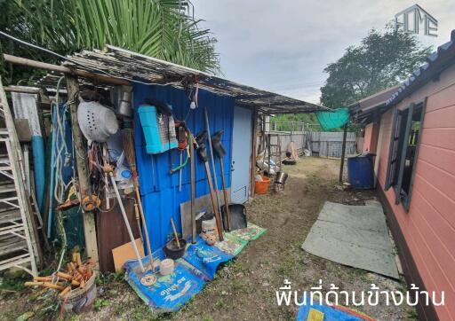 Outdoor Storage Area with Garden Tools