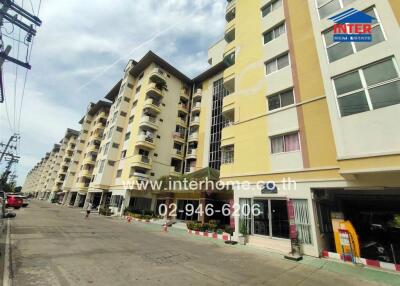 Residential building exterior with multiple floors