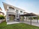 Modern two-story house with a carport