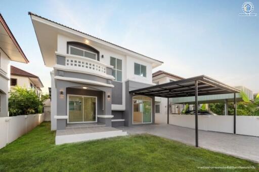 Modern two-story house with a carport