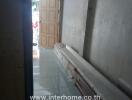 narrow corridor or storage area under construction