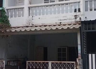 Two-story house with balcony and front yard