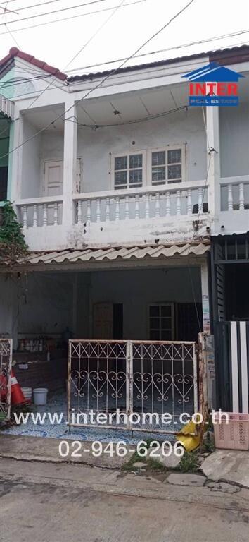 Two-story house with balcony and front yard