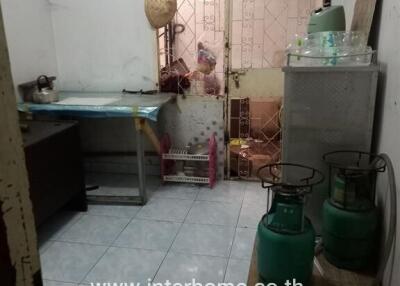 Kitchen with gas canisters and appliances