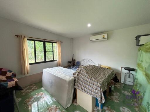 This lovely single storey home ,3 bedroom on 1 rai land in a semi rural area in San Kamphaeng, Chiang Mai