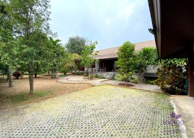 Lovely property with 2 homes on a large plot of land with many fruit trees at Muang Kaew, Mae Rim