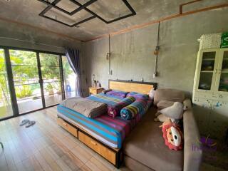 Beautiful property with 2 modern houses on a large plot of land in a semi-rural area in Doi saket, Chiang Mai.