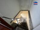 Stairwell in a property with metal railing