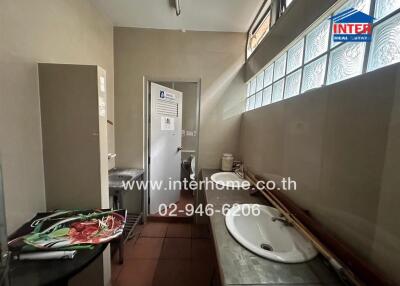 Small kitchen with sink and counter space