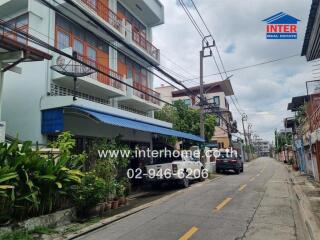 Exterior view of a building along a residential street