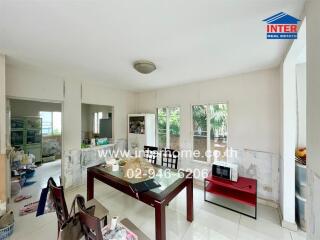 Dining area with a view of greenery outside