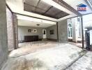 Covered garage space with storage area and entrance to the house