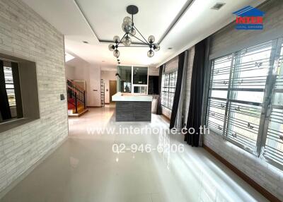 Modern kitchen with island and large windows