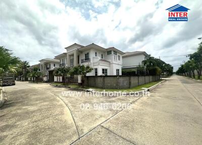 Exterior view of a residential property in a gated community