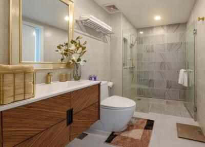 Modern bathroom with wooden vanity and glass shower