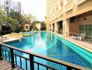 Swimming pool with surrounding buildings