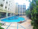 Outdoor pool area in an apartment building