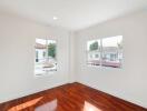 bright and spacious bedroom with wooden floor