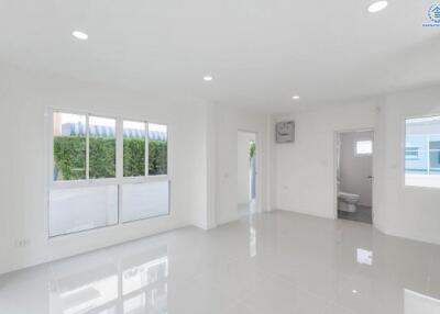 Bright and spacious living room with large windows