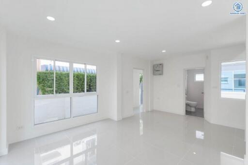 Bright and spacious living room with large windows