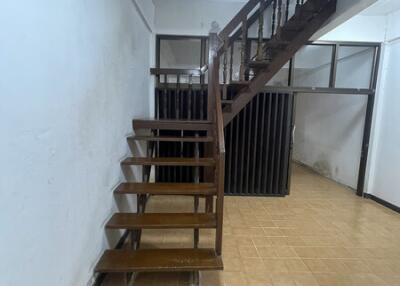 Wooden staircase with mezzanine