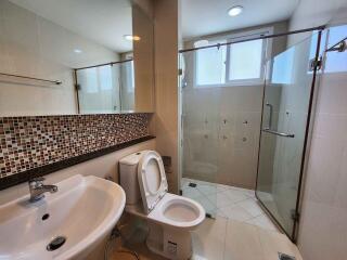 Modern bathroom with a glass-enclosed shower