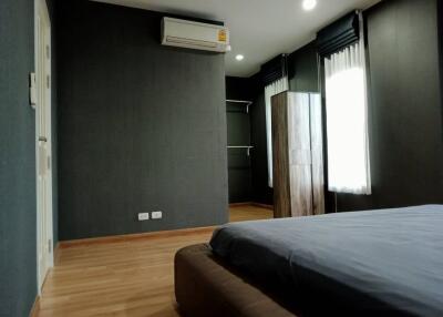 Modern bedroom with air conditioning and minimalist design