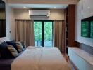 spacious bedroom with wooden ceiling and modern decor