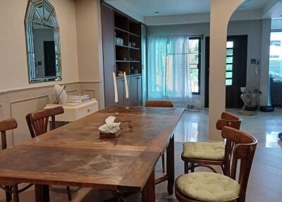 Dining area with wooden table and chairs