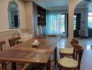 Dining area with wooden table and chairs