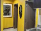 Hallway with yellow walls and modern decor