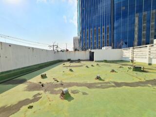 Rooftop area of the property with views of adjacent buildings