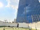 View of a tall building with an empty rooftop area